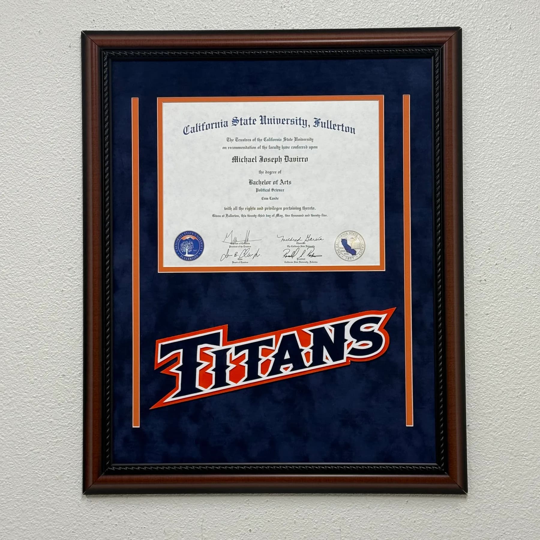 Refined diploma framing with custom matting and crisp detail.