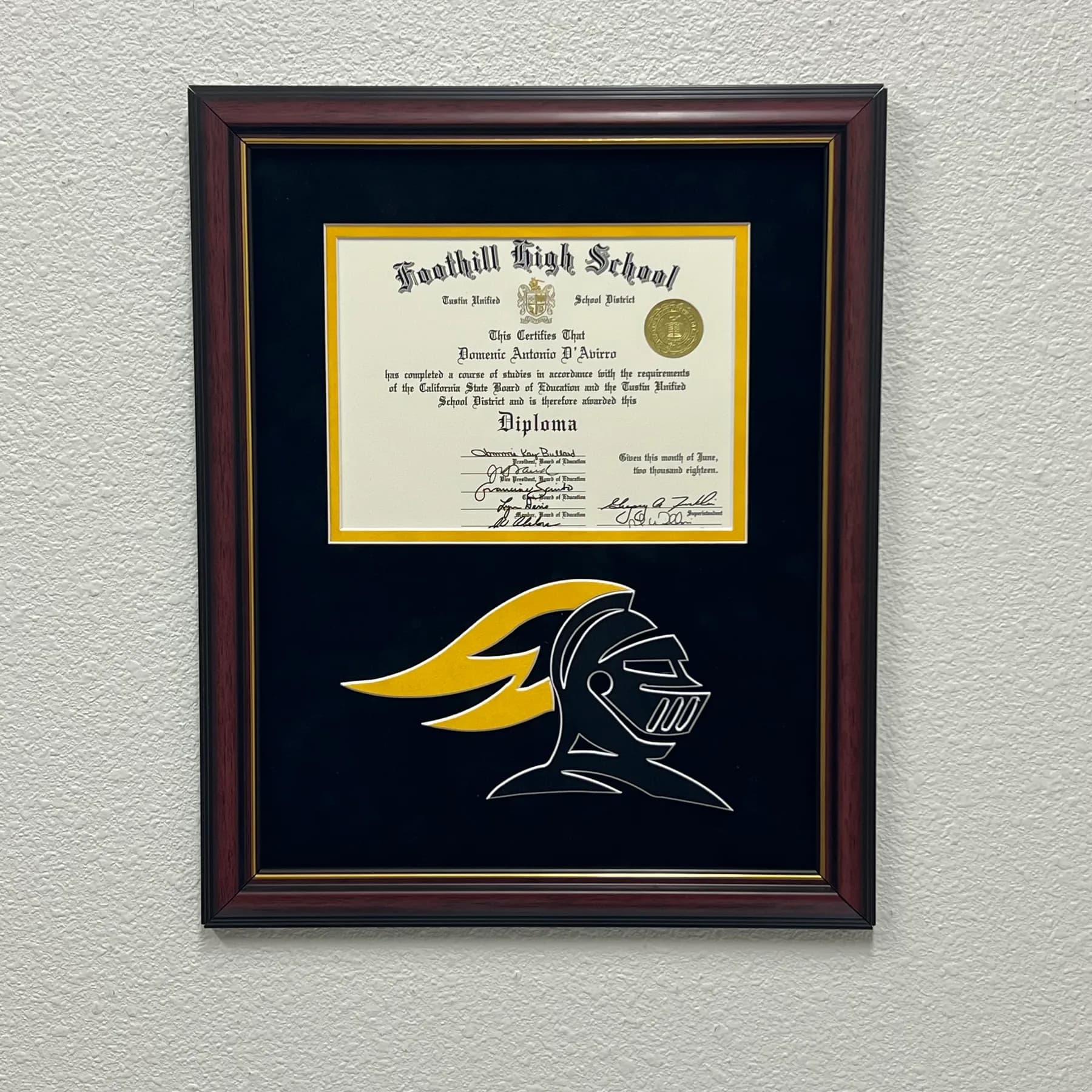Refined diploma framing with custom matting and crisp detail.