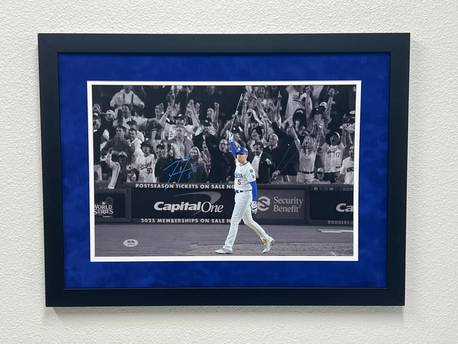 Custom framing for cherished photographs and signed images.